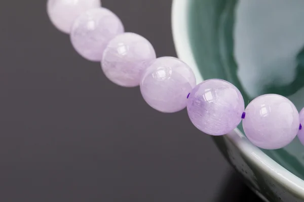 Purple bracelet made of glass stones — Stock Photo, Image