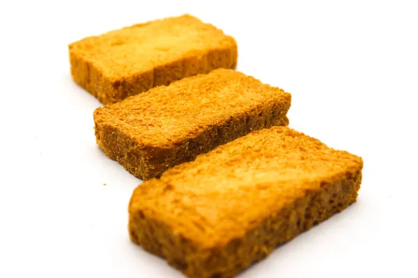 Crispy Rusk Witte Achtergrond Met Selectieve Focus Stockafbeelding