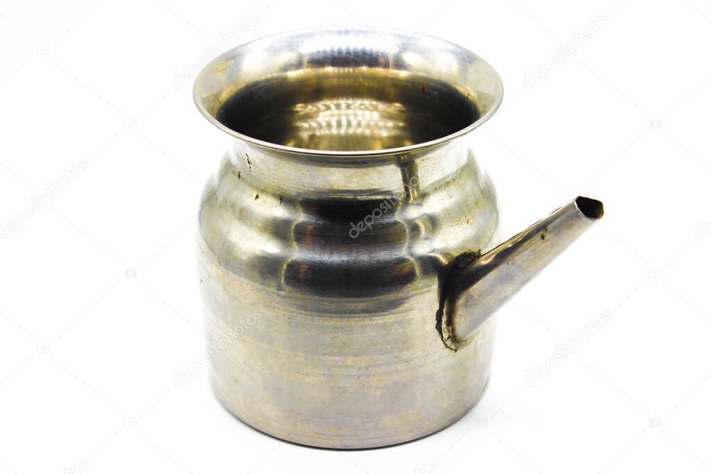 Stainless Steel Lota on white background with selective focus