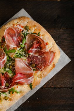 Sea products pasta with pepper and cheese Parmesan and sauce and tomatoes 