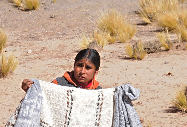 Woman-indian sells clothes.