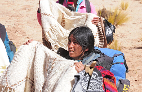 Woman-indian sells clothes.