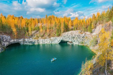Lake in the deep marble canyon. Ruskeala Mountain Park. Republic of Karelia. clipart