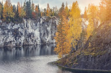 Lake in the deep marble canyon. Ruskeala Mountain Park. Republic of Karelia. Russia. clipart