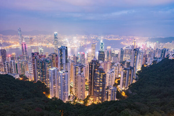 View of the downtown of Hong Kong from Victoria Peak at sunset.