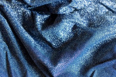 Göz kamaştırıcı bir arka plan. Gümüş renkli parıltı dokusu, Noel tatili, duvar kağıdı dekorasyonu, selamlama ve düğün davetiyesi tasarım unsuru için parlak parlak ambalaj kağıdı arka planı