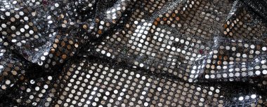 Göz kamaştırıcı bir arka plan. Gümüş renkli parıltı dokusu, Noel tatili, duvar kağıdı dekorasyonu, selamlama ve düğün davetiyesi tasarım unsuru için parlak parlak ambalaj kağıdı arka planı