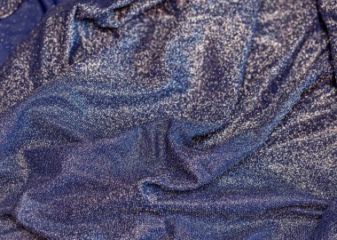 Göz kamaştırıcı bir arka plan. Gümüş renkli parıltı dokusu, Noel tatili, duvar kağıdı dekorasyonu, selamlama ve düğün davetiyesi tasarım unsuru için parlak parlak ambalaj kağıdı arka planı