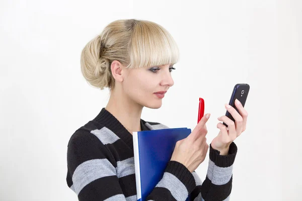 Manager writes messages by the mobile phone — Stock Photo, Image