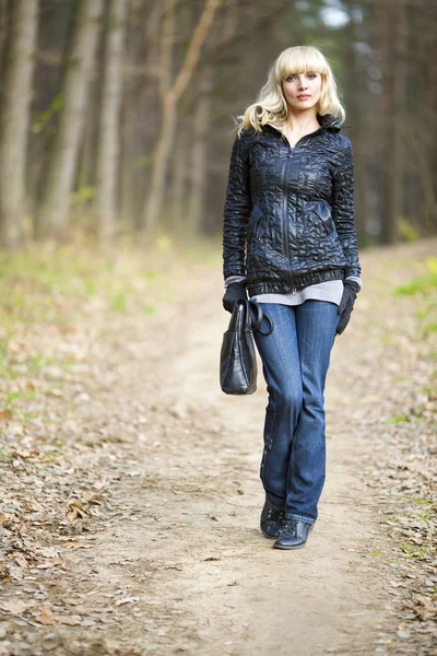 Girl on walk on the autumn wood — Stock Photo, Image