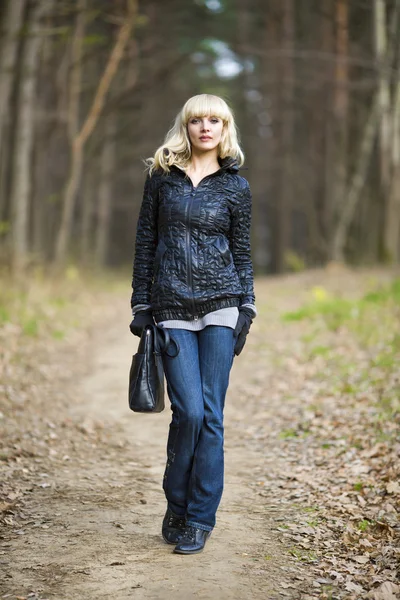 Girl on walk on the autumn wood — Stock Photo, Image