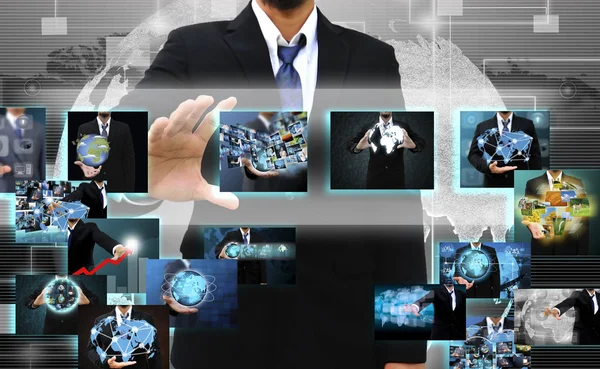 Businessman holding Reaching images streaming in hands . — Stock Photo, Image