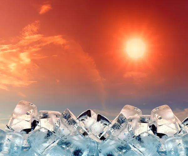 Ice cubes in red sky — Stock Photo, Image