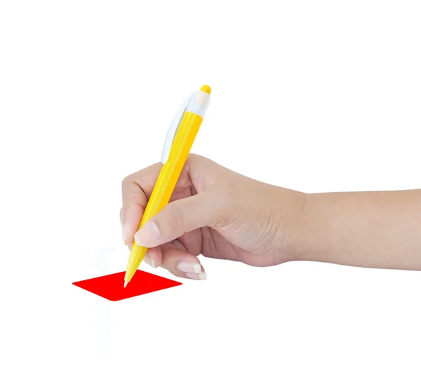 Γυναικείο χέρι με κίτρινο στυλό πάνω από το λευκό φόντο — Φωτογραφία Αρχείου