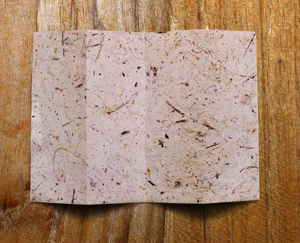 Fondo de papel viejo sobre madera — Foto de Stock