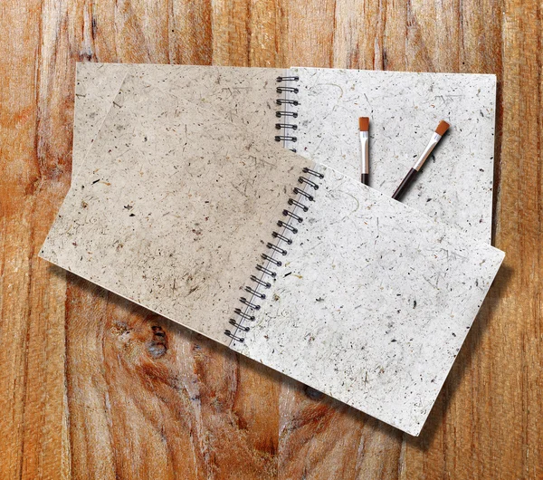 Blank page sketch book on wood table horizontal — Stock Photo, Image