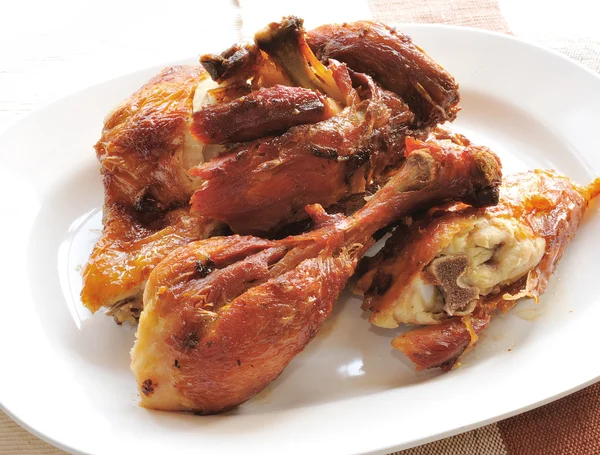 Fried chicken on a white plate — Stock Photo, Image