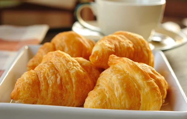 Breakfast with croissants and coffee — Stock Photo, Image