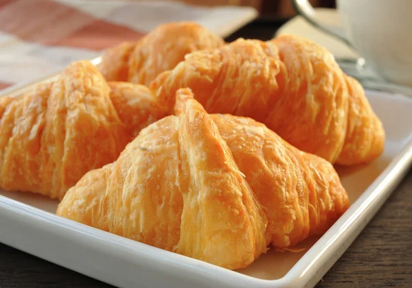Breakfast with croissants and coffee — Stock Photo, Image