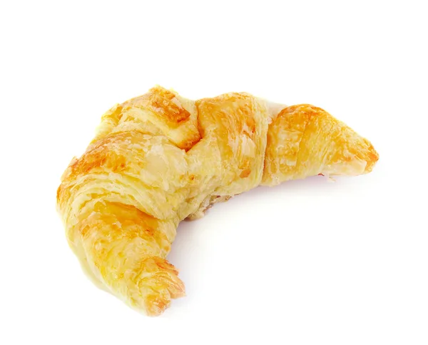 Croissant fresco e gustoso su sfondo bianco — Foto Stock