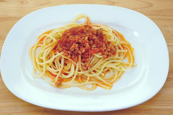Spaghetti with pork in tomato sauce — Stock Photo, Image