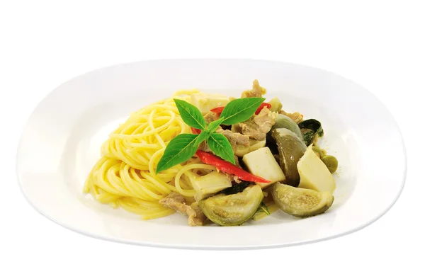 Spaghetti with green pork curry — Stock Photo, Image
