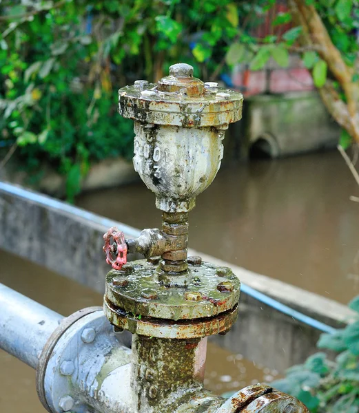 Old industrial pipelines and valve — Stock Photo, Image