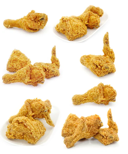 Zlatá hnědá smažené kuře na bílém pozadí — Stock fotografie
