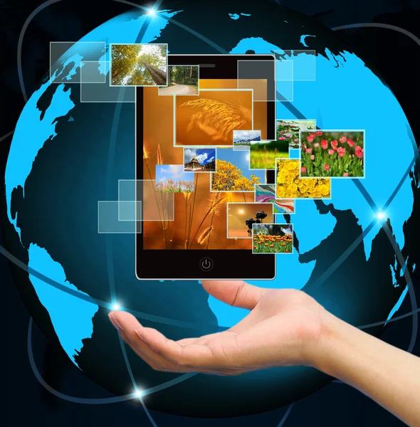 Holding mobile smart phone with world technology background — Stock Photo, Image