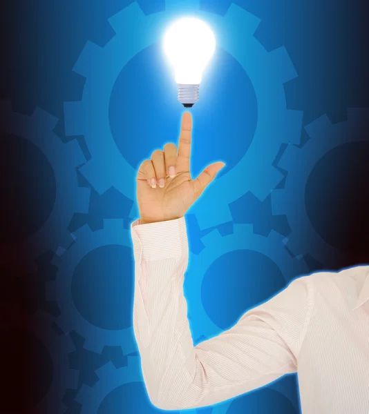 Kvinna hand visar på idé lampan — Stockfoto