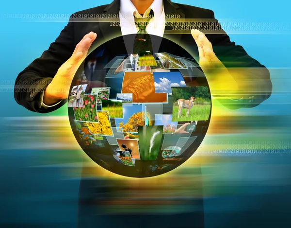 Businessman hand holding world Social Network Display — Stock Photo, Image