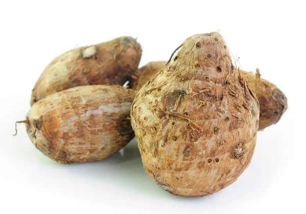 Group of taro roots on white background — Stock Photo, Image