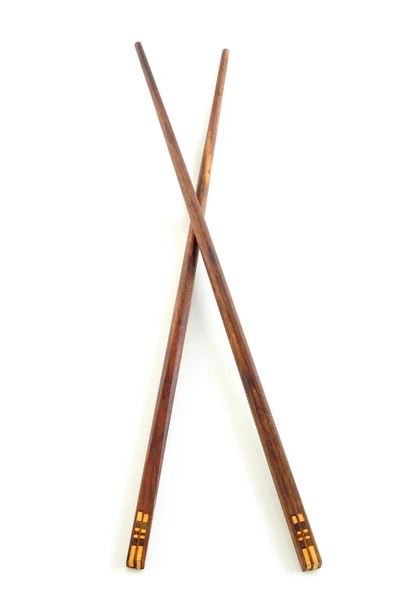 Dřevěné hůlky, izolované na bílém pozadí. — Stock fotografie