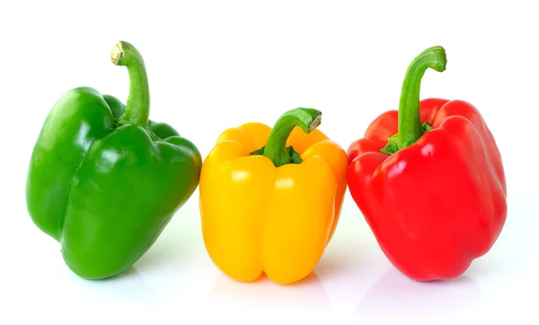 Green yellow red pepper on white background — Stock Photo, Image