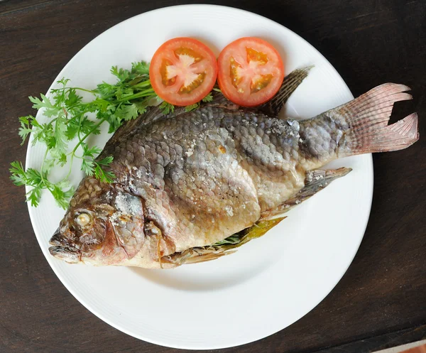 Grill fish with salt on plate — Stock Photo, Image