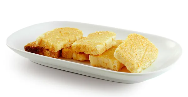 Garlic bread on white plate — Stock Photo, Image