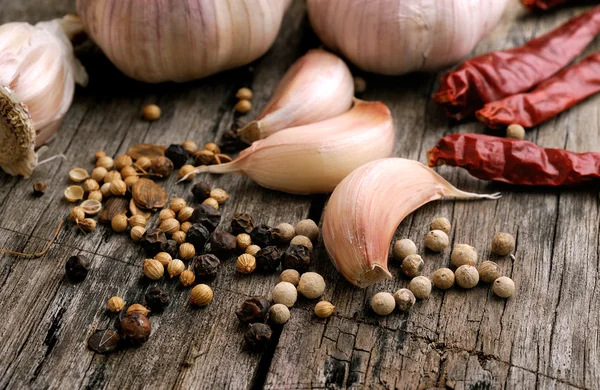 Herbs and Spices on wooden background — Stock Photo, Image