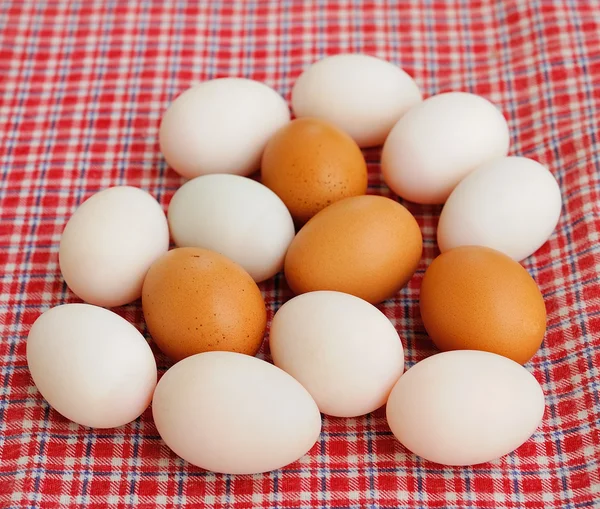 Eggs on tablecloth — Stock Photo, Image