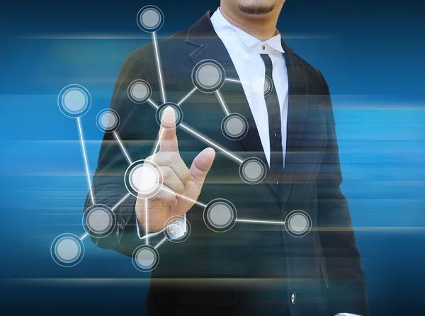 Businessman pushing a touch screen interface — Stock Photo, Image