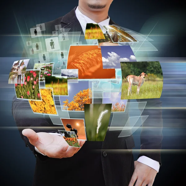 Businessman holding social network — Stock Photo, Image