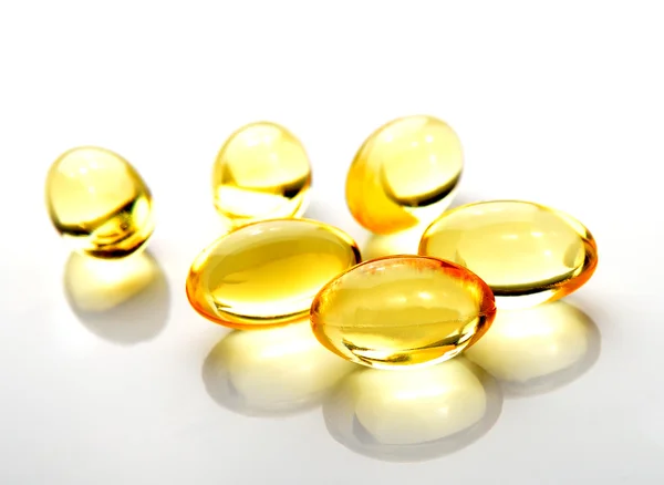 Fish oil pill on white background — Stock Photo, Image