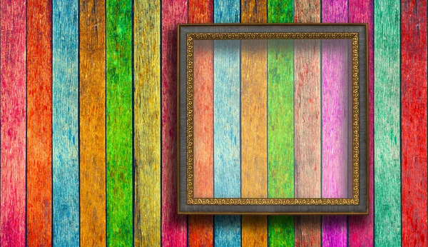 Fotoframe op kleurrijke houtstructuur — Stockfoto
