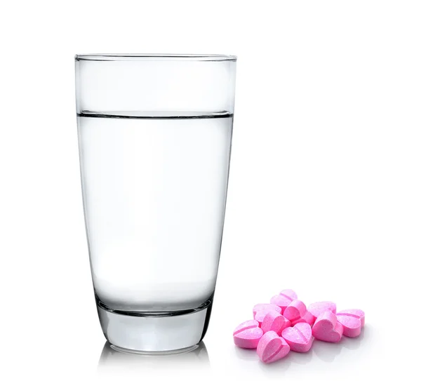 Glass of water and pills isolated on white background — Stock Photo, Image