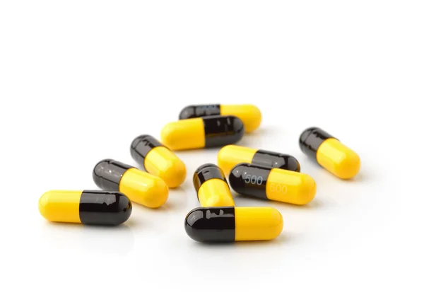 Tabletta kapszula izolált fehér háttér — Stock Fotó