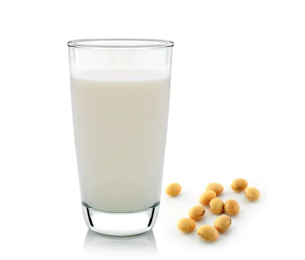 Milk with soy beans on white background — Stock Photo, Image