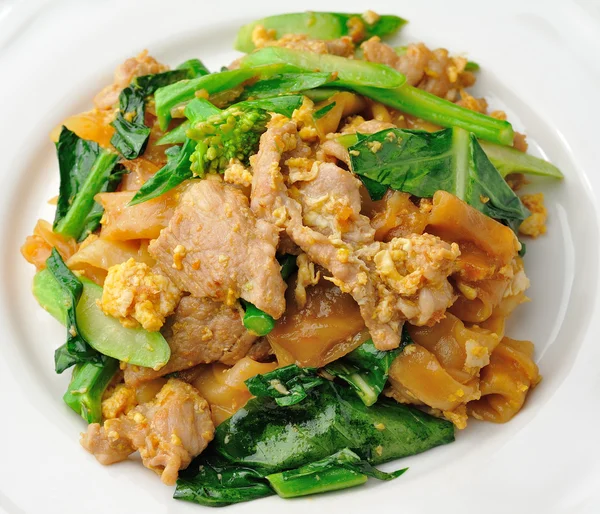 Mexer macarrão de arroz frito com carne de porco — Fotografia de Stock