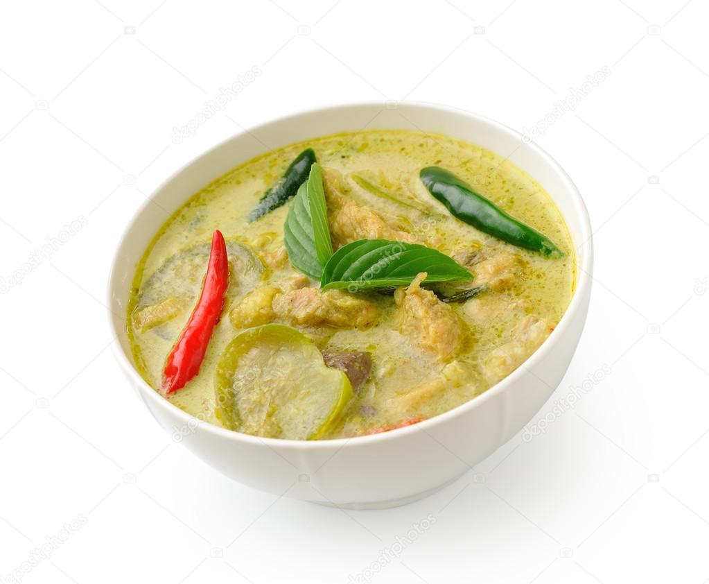 Thai food chicken green curry in the white bolw on white backgro