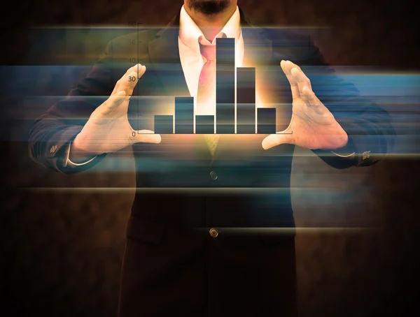 Graphs on the hands of businessmen. — Stock Photo, Image