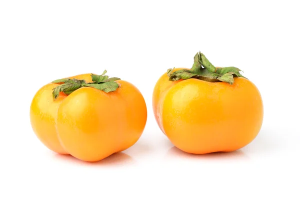 Ripe persimmons isolated on white background — Stock Photo, Image