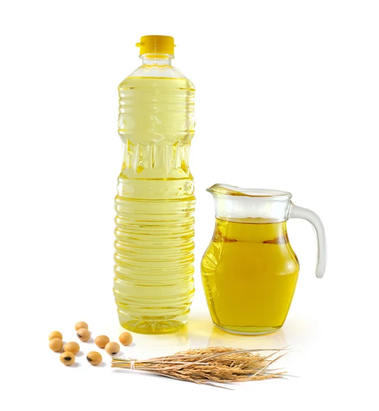 Rice bran oil in bottle glass with rice and soy on white backgro — Stock Photo, Image